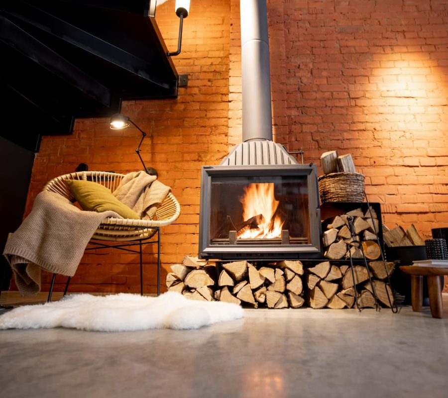 cozy-fireplace-with-firewood-loft-style-home-interior-with-brick-wall-background-burning-fire-fireplace-house-coziness-winter (1)